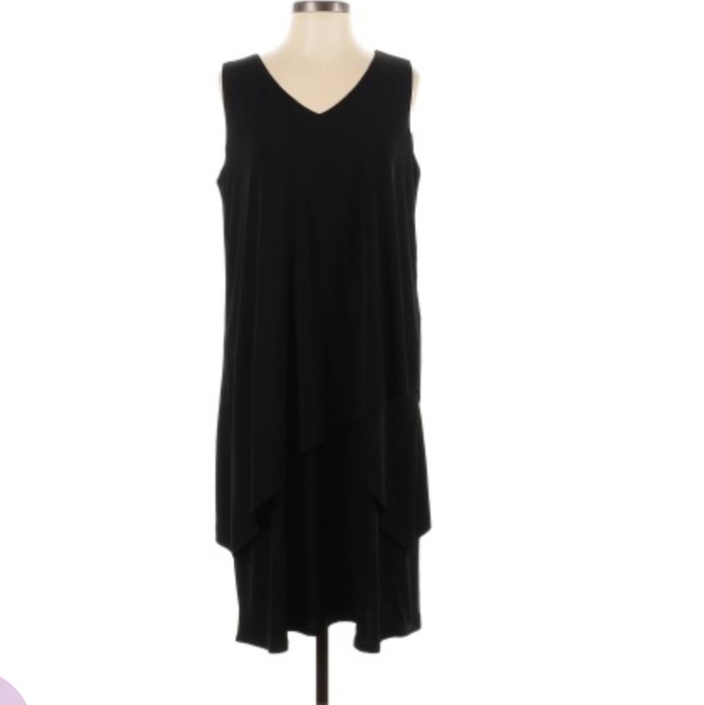 Susan Graver women's ruffles dress at bottom Form fitting but has stretch.